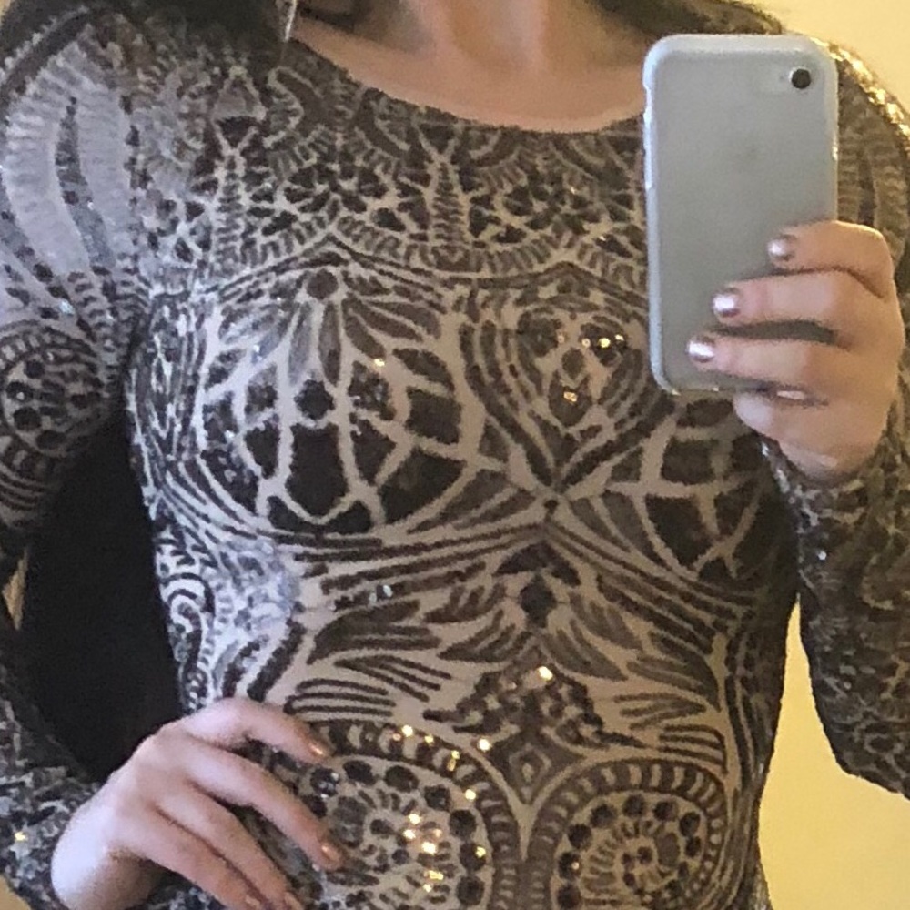 Stunning, sexy, sequined Betsy Adam party dress.
